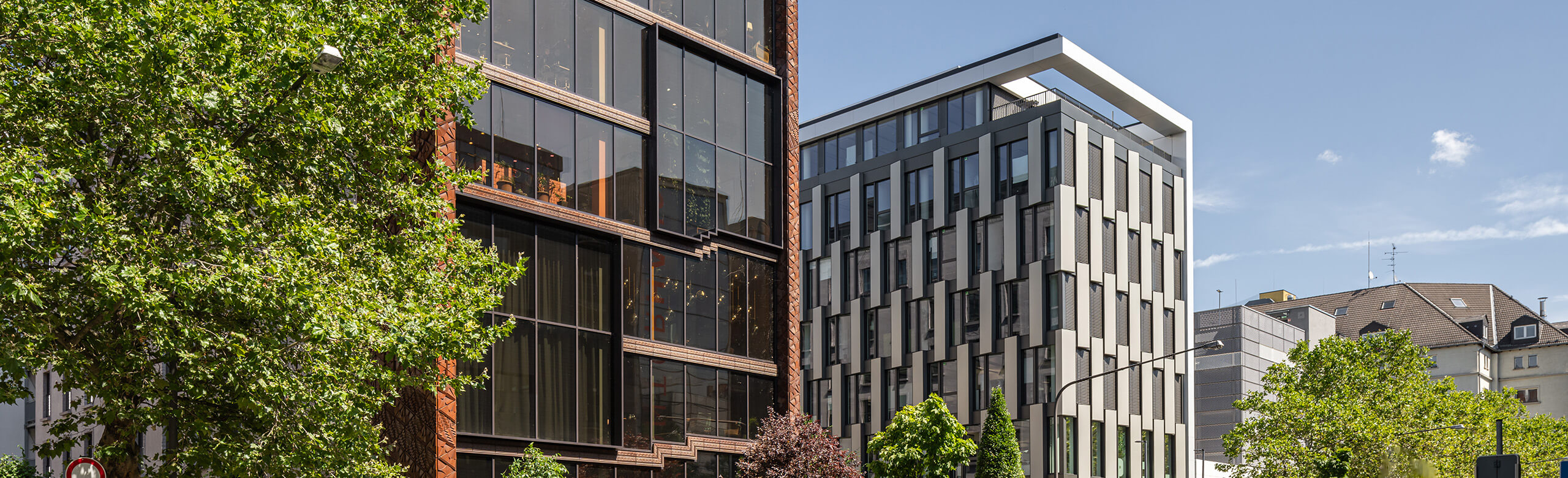Glass front of the Lindley Lindenberg Hotel in Frankfurt.